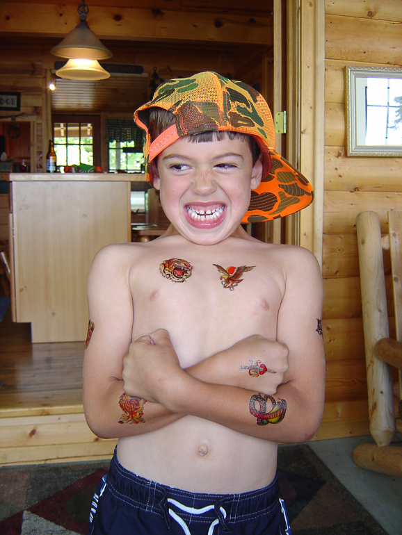 Sporting His New Ink, Torch Lake: Matthew Kish