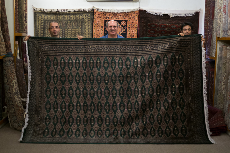 Faruk & Ted display Ted's new rug.